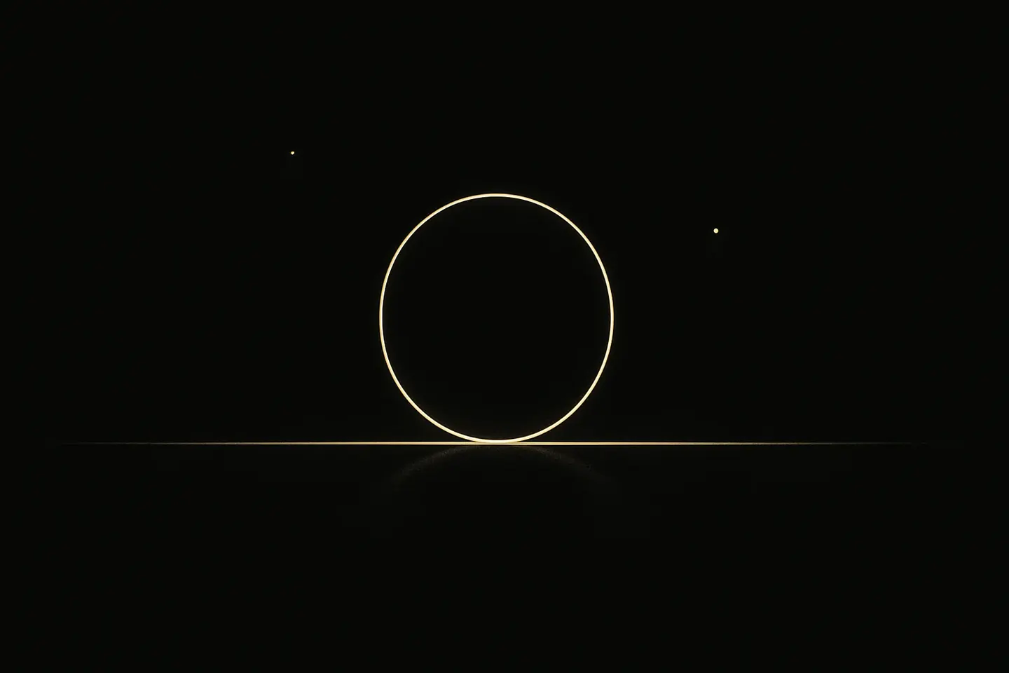 A thin gold circle balanced on its edge on a thin line, on black, casting two faint identical shadows