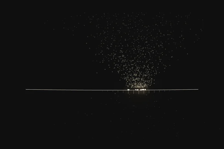 A thin gold horizontal line across black with a dense field of faint points falling through it and a few bright points caught on the line