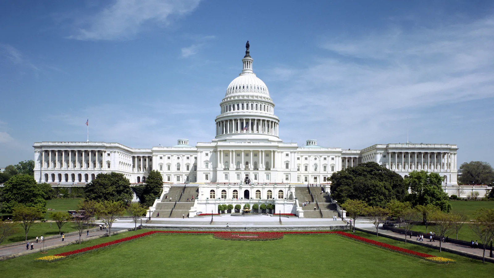 The United States Capitol and its dome seen from the west lawn on a clear day